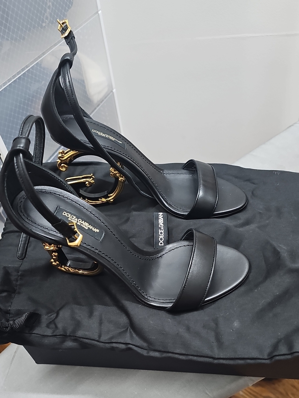 Dolce & Gabbana Black Leather Heeled Sandals with Gold Sculptural Heel